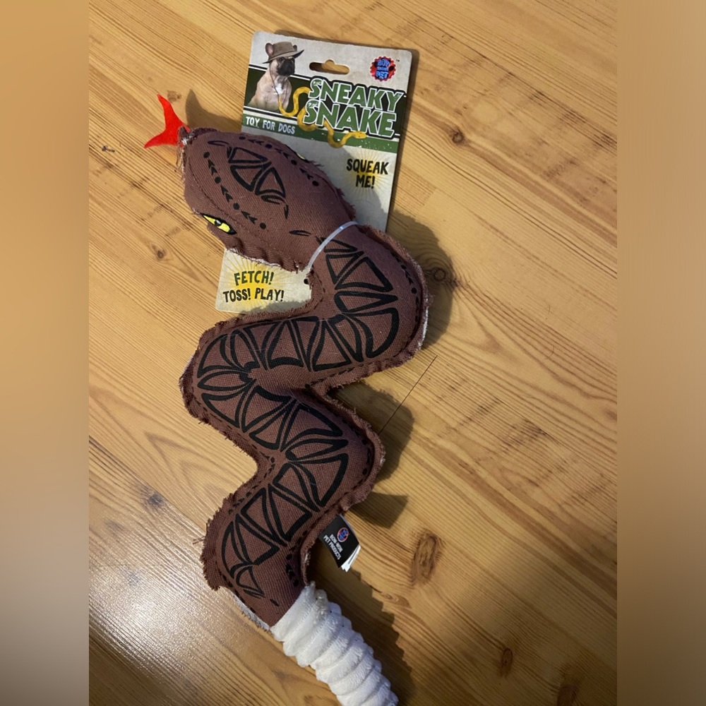 Dog toy snake with squeaker in the tail